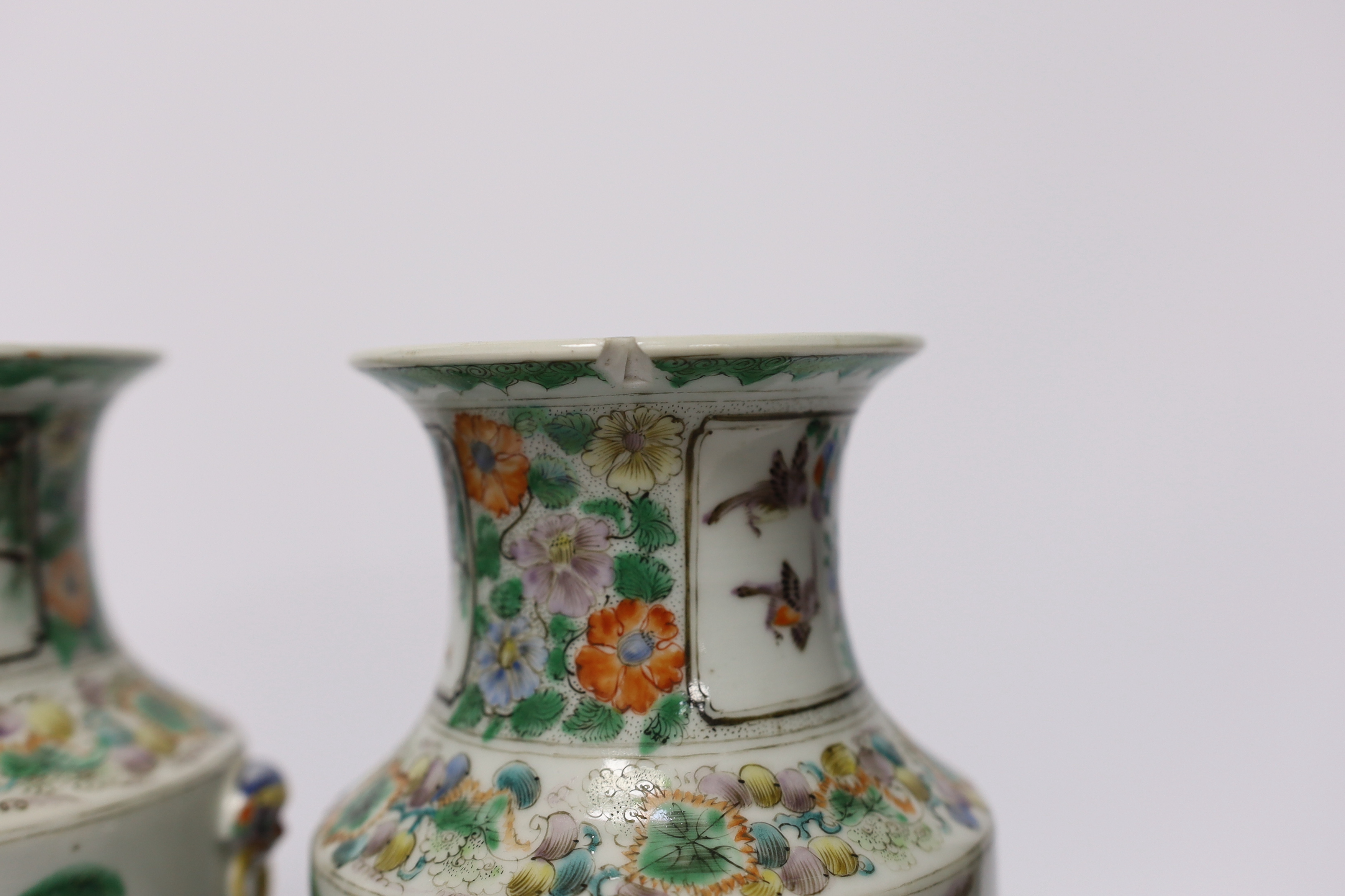 A pair of 19th century Chinese famille verte ‘ladies’ vases, 23cm